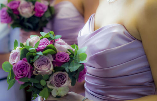 Bridesmaids Holding Colorful Wedding Bouquets
