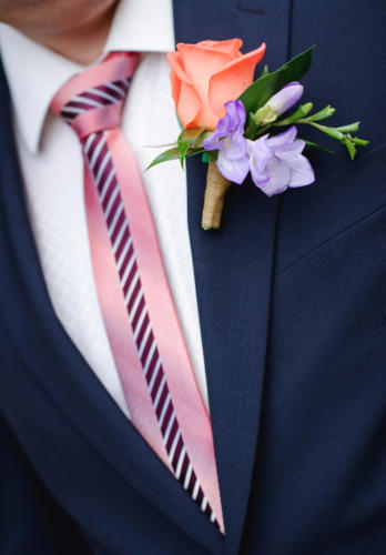 groom with flowers