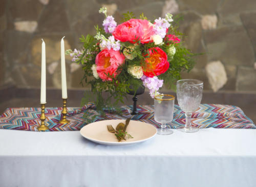 Table setting in vintage style is decorated with flowers